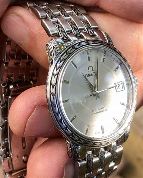 omega watch engraving